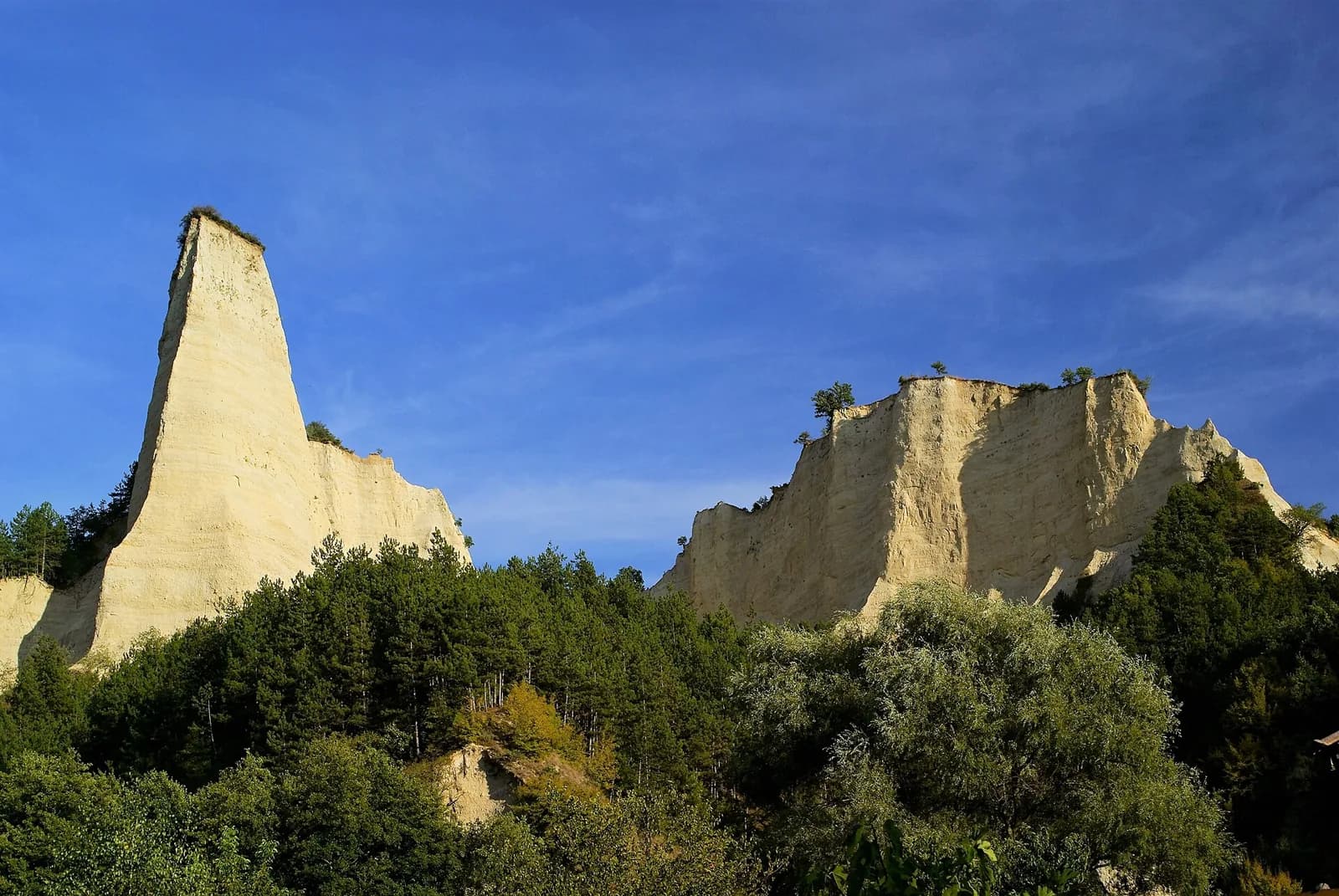 Tall pale sedimentary-rock pinnacles near Karlanovo in the Melnik Pyramids