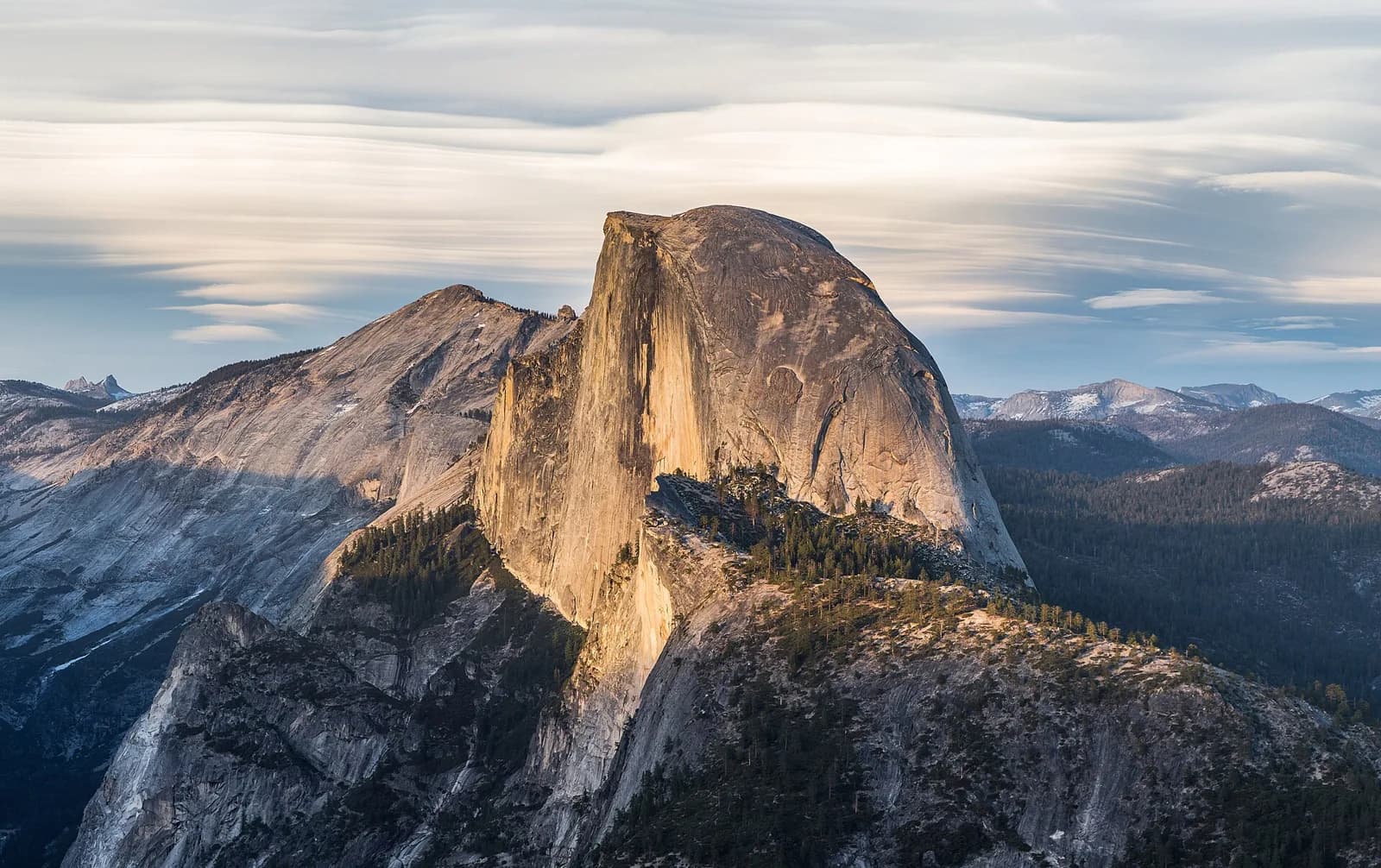 Half Dome lit by low sunlight above Yosemite Valley